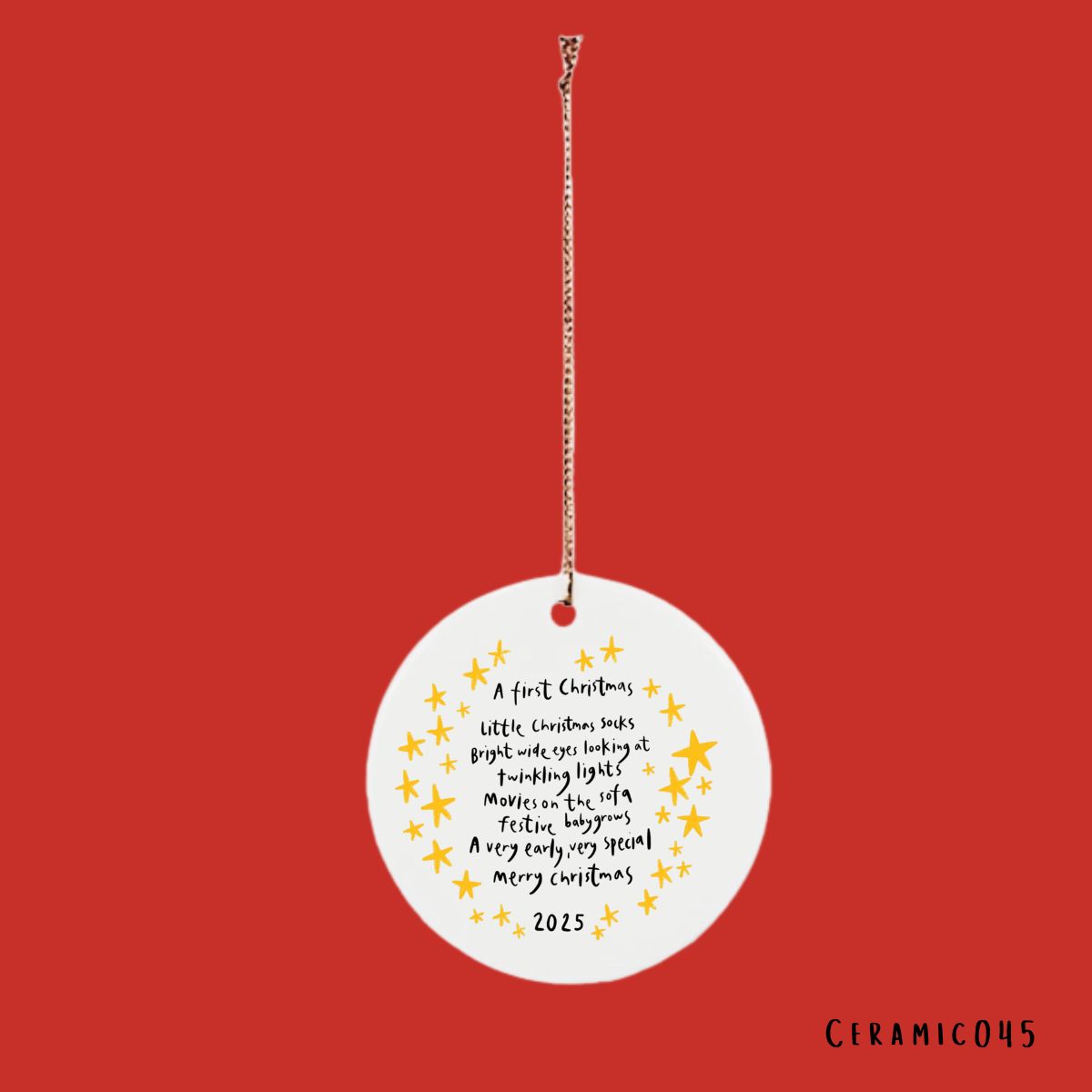 A first Christmas 2025 ceramic bauble